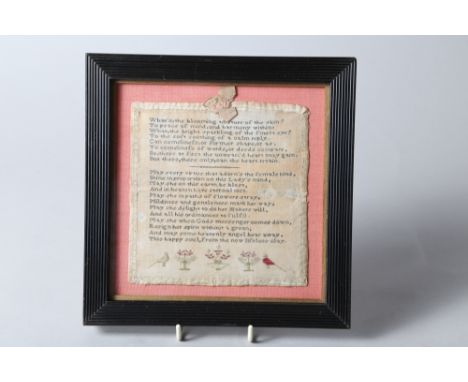 A 19th century verse sampler, 5 1/4" square, in ebonised reeded frame 