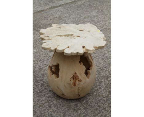 A turned and carved yew bole with slice of trunk top (to polish), 26" dia x 22" high 