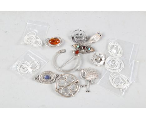 A white metal Celtic design cloak pin, a Scottish silver brooch by Ola M Gorie, and other silver jewellery 