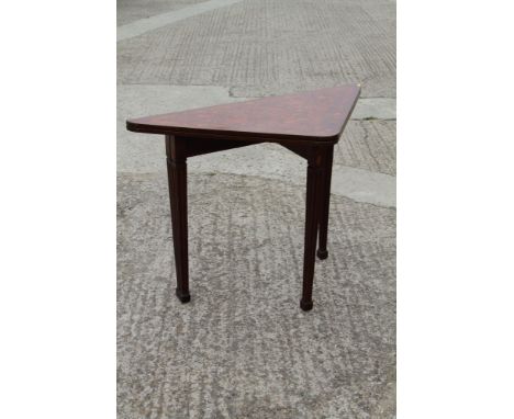 A 19th century mahogany and floral marquetry triangular fold-over top collapsible card table, on square taper supports, 29" w