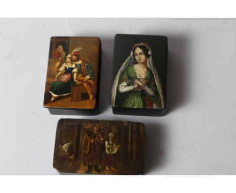 An early 19th century papier-mache rectangular snuff box with violin player and maid, 3 3/8" wide, a similar snuff box with f