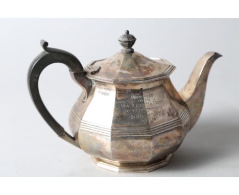 A silver ten-sided teapot with ebonised handle and knop, with engraving, 22.3oz troy approx 
