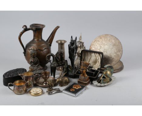 A bronzed figure of a Buddha, 6" high, a ceramic pot and cover with carved elephant decoration, a copper jug, a Soviet cigare