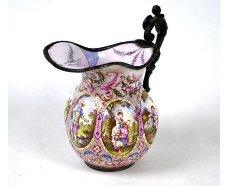 A 19th century Vienna (probably) silver and enamel cream jug with winged caryatid scroll handle, the lobed body painted with 