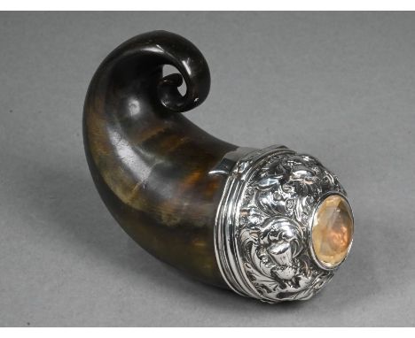 A Victorian Scottish ram's horn snuff-mull, the weighted unmarked white metal hinged cover set with a pale gemstone