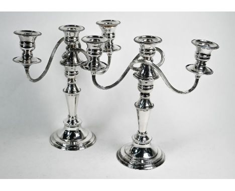 Pair of epns baluster candelabra with detachable twin-branches and three sconces, 27 cm high