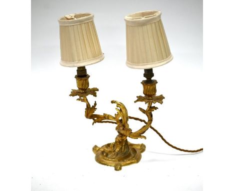 A vintage rococo style gilt metal twin arm table lamp, 22 cm h plus the shades