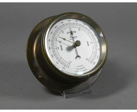 A Marpo (Marton Products) brass-cased ship's barometer with silvered dial, 11.5 cm overall