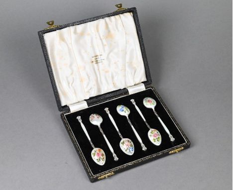A cased set of six silver and enamel coffee spoons with individually-painted backs to the bowls and Art Deco style finials, H