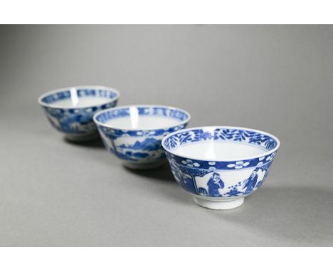 Three 19th century Chinese blue and white bowls painted in underglaze blue with alternating panels of scholars and riverside 