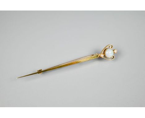 A 15ct gold sword brooch set with opal and two pearls, 7.5 cm, 2.7g all in&nbsp;