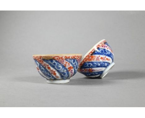 A pair of rare 18th Century Chinese Queen Charlotte pattern tea bowls, Kangxi period, Qing dynasty, spirally gardrooned with 