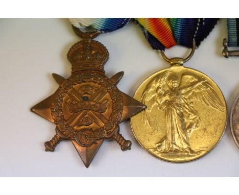 A full size WW1 Medal Trio to include The 1914 Star, The British War Medal & The Victory Medal issued to : 6633 PTE. H. WOODM