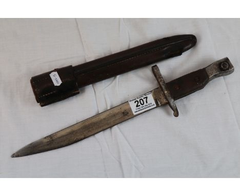 A Canadian Ross bayonet with second pattern blade, brown leather scabbard, marked MKII to pommel and scabbard, broad arrow al