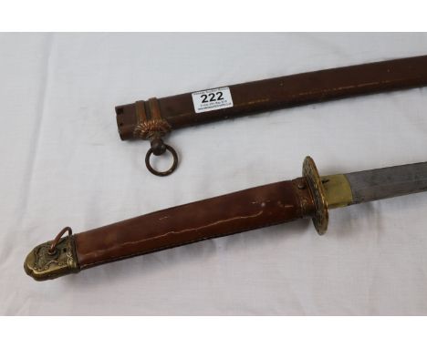 Japanese Samurai Sword with leather covered scabbard and handle.