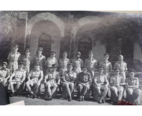 A collection of military photographs to include a 1947 photograph album from india, a large group photograph on card of the s