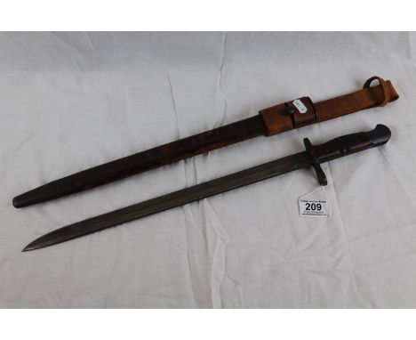 An original WW1 1913 Pattern P14 Rifle Bayonet with leather scabbard and bayonet frog. Manufactured by Remington and dated 4 