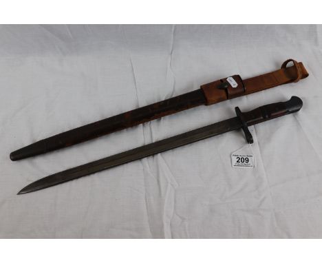 An original WW1 1913 Pattern P14 Rifle Bayonet with leather scabbard and bayonet frog. Manufactured by Remington and dated 4 