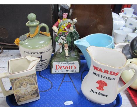 The Dewar Highlander Advertising Figure, circa 1930's for Dewar's Scotch Whisky, 23cm high, three Whisky water jugs, flagon.