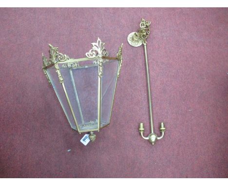 A XX Century Gilded Brass Hexagonal Shaped Ceiling light, with glass panels.