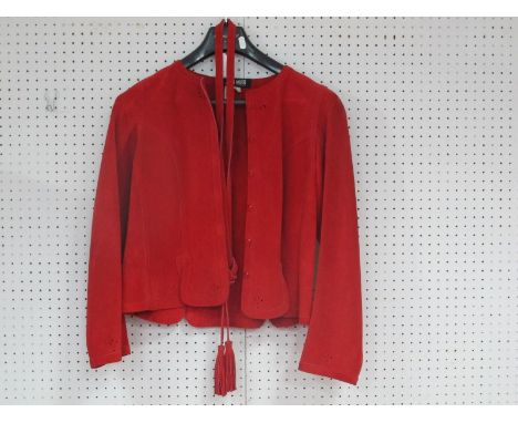 A Vintage Jean Muir Red Suede Jacket, of fitted collarless design with cut-out details and fringed belt (size 12).