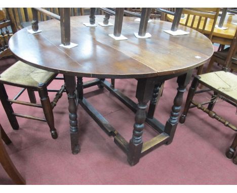 XVII Century Style Oak Gate Leg Table, with drop leaves, single drawer, on turned and block supports.