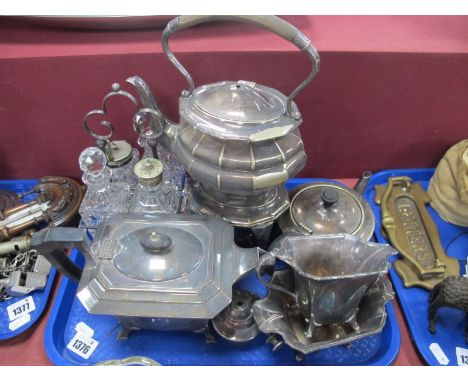 Four Bottle Cruet Set, spirit kettle, three piece plated tea service, etc:- One Tray.