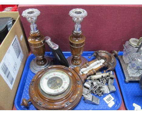 A Pair of Oak and Chrome Candlesticks, 23cm high, barometer, seven whistles on chain, hip flask.