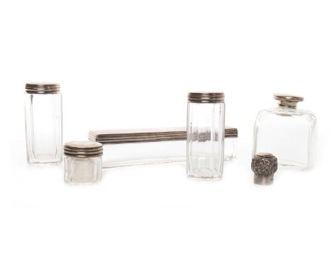VICTORIAN SILVER TOPPED VANITY SETmaker James Vickery, London 1874, comprising two tall and one short cylindrical jars, shape