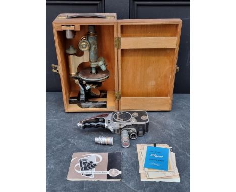 A vintage microscope, (a.f.), in plywood box; together with a Paillard-Bolex B8 cine camera, with instructions. (2)