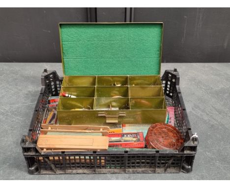 Angling: a large quantity of fishing floats, plugs, lures, and line keepers.