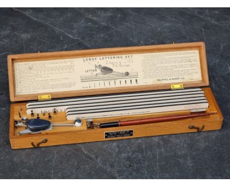 An oak cased Keuffel &amp; Esser 'Leroy Lettering Set'. 