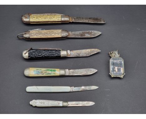 Six vintage penknives, to include a silver bladed mother-of-pearl example; together with a folding lorgnette. (7)