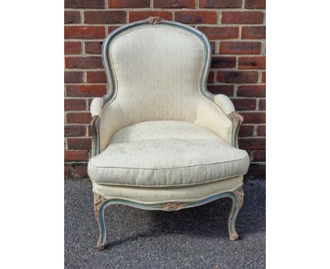 A Louis XVI style painted frame and damask fauteuil.&nbsp; 