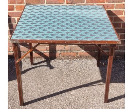 An unusual late Victorian mahogany patent folding card table, inscribed Mudie's Squeezer Card Table, 15, Coventry Street, Lon