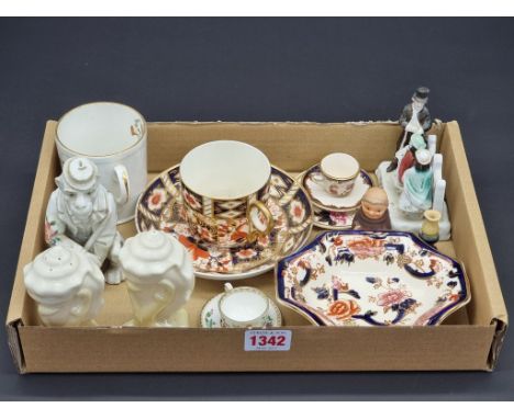 A mixed group of pottery and porcelain, to include a Royal Crown Derby Imari cup and saucer; and a pair of Belleek shell pepp
