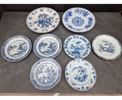 Two tin glazed Earthenware delftware plates, 31cm diameter; together with two smaller examples; and four 18th century Chinese