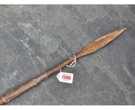 Ethnographica: a tribal spear, 129cm long.