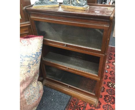 A mahogany three tier Globe Wernicke type bookcase