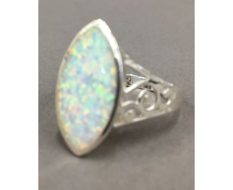 A silver and opal ring