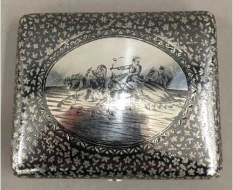 A Russian silver and niello cigarette case depicting two men on a troika driving through the snow, with maker's mark and 84 Z