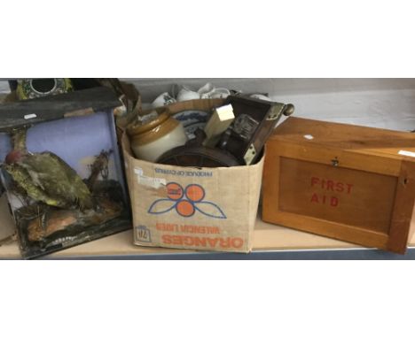 A first aid box, a barometer, a stuffed parrot, etc.