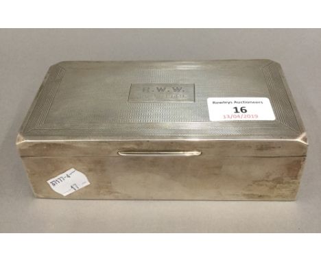 A silver cigarette box