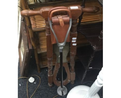 A vintage boot pull and a shooting stick