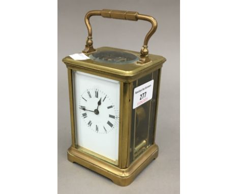 A brass cased carriage clock