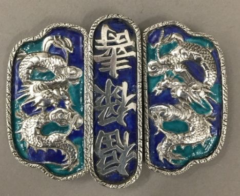 A vintage Chinese silver and enamel belt buckle with calligraphy and dragons