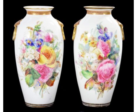 A PAIR OF ROYAL WORCESTER TAPERED OVIFORM VASES WITH   GILT RING SHOULDER HANDLES PAINTED TO EITHER SIDE WITH GROUPS OF FLOWE