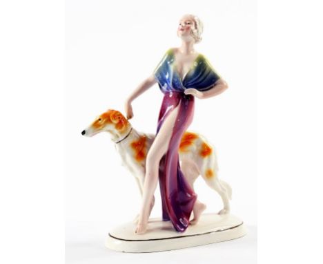 AN ART DECO KATZHUPTE EARTHENWARE FIGURE OF A SEMI NAKED YOUNG WOMAN, 22CM H, PRINTED  MARK
