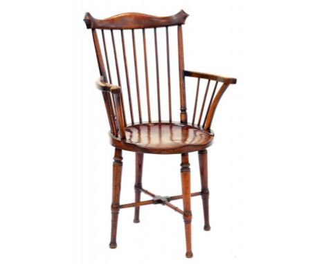 AN EARLY 20TH CENTURY STAINED BEECH COMB BACK WINDSOR CHAIR                                                   