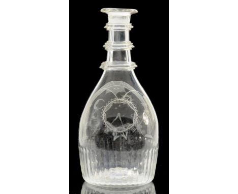 AN IRISH DIP  MOULDED GLASS PRUSSIAN  DECANTER, WHEEL ENGRAVED WITH  MASONIC EMBLEMS BENEATH AN ARCH, THE REVERSE WITH BARLEY